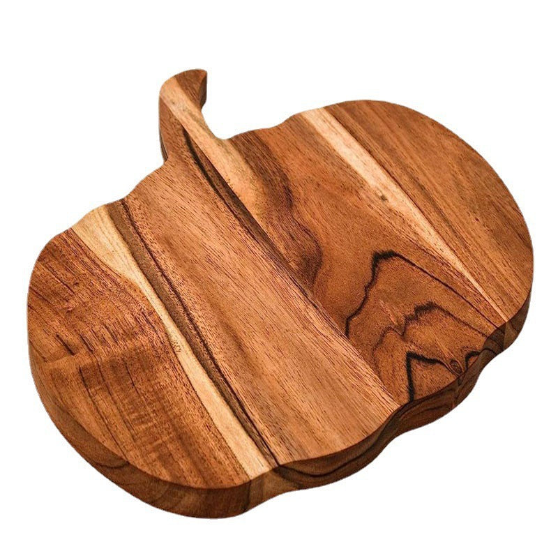 Holz-Schneidebrett in Kürbis-Silhouette aus Akazienholz mit ergonomischem Griff
