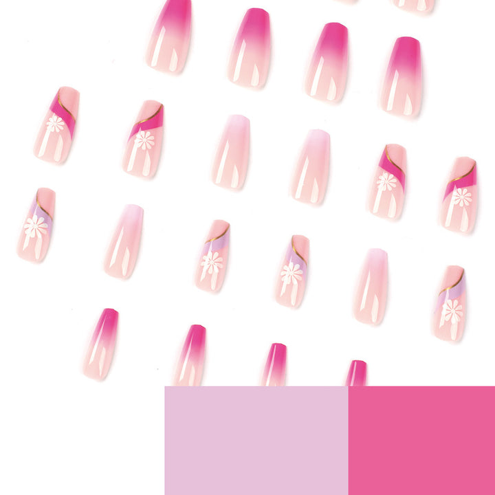 Kunstvolle Nagelverlängerungen mit buntem Ombre-Design und floralen Akzenten Karnz