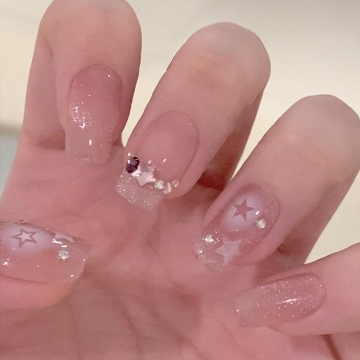 Glitzernde Kunstfingernägel mit Mond- und Sternmotiven Karnz