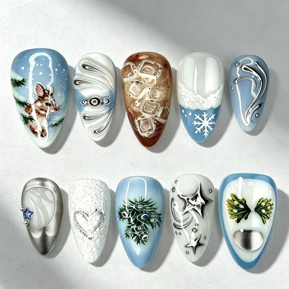 Kunstnägel mit Festlichen Wintermotiven Karnz