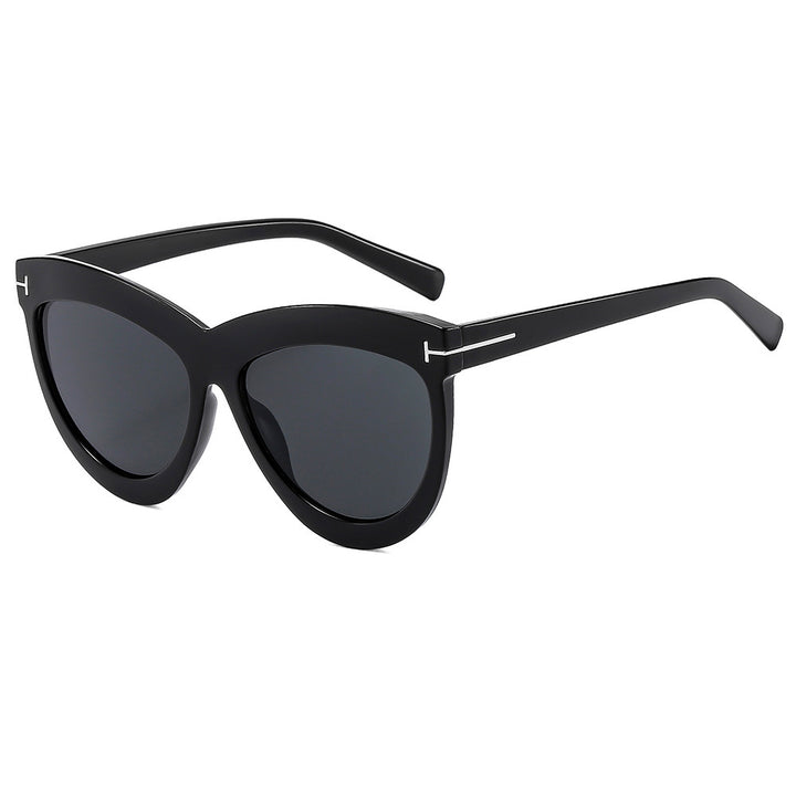 Stilvolle Katzenaugen-Sonnenbrille mit schlanken Metallakzenten Karnz