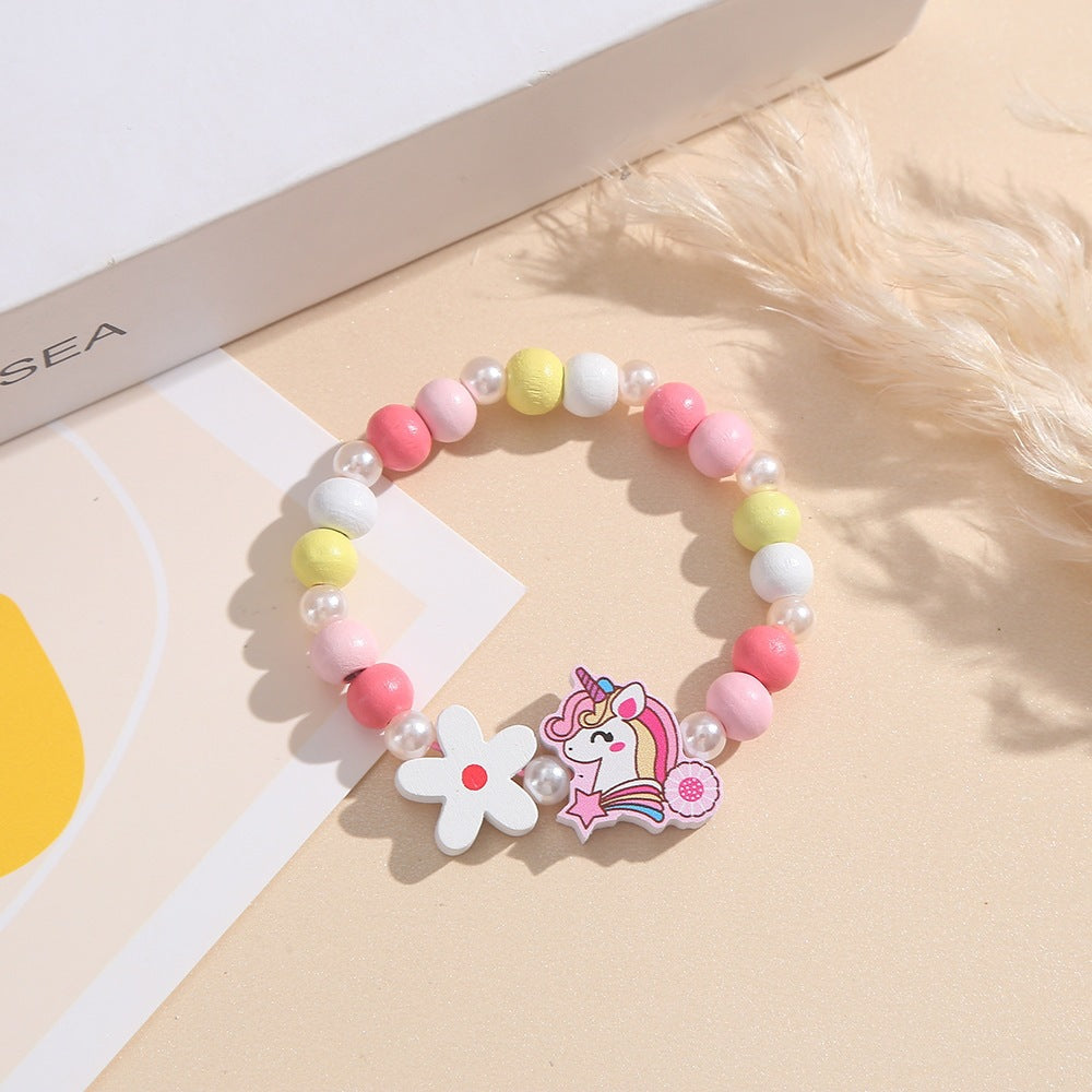 Verspieltes Kinderarmband mit Einhorn- und Blumenmotiv Karnz