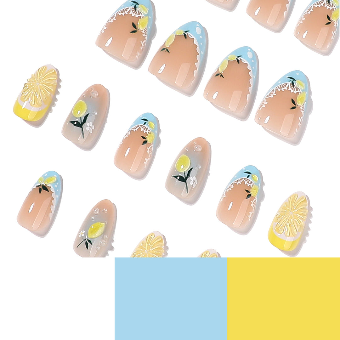 Künstliche Nagelkunst mit Zitronen- und Blütenmotiven Karnz