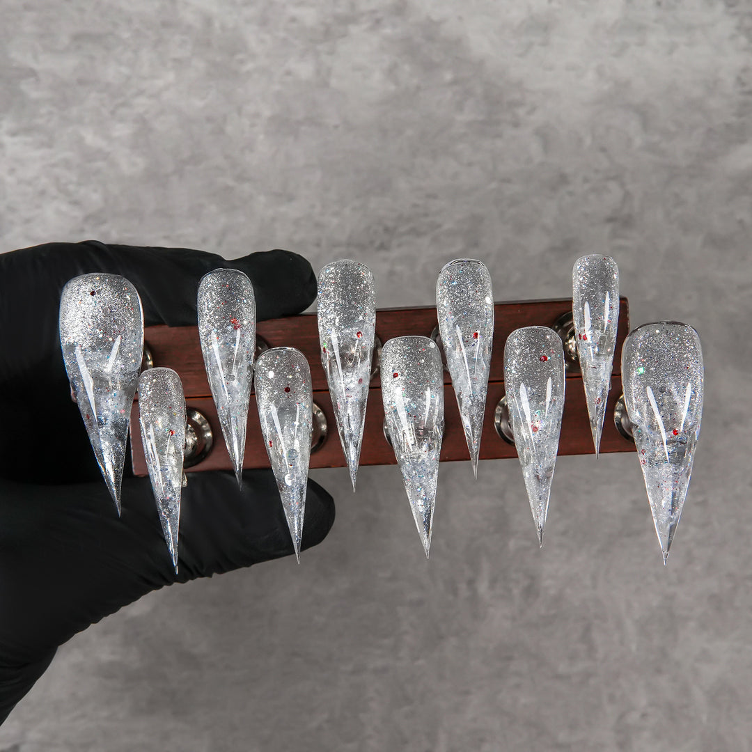 Glamouröser Stiletto Press-On Nagelset mit Glitzerelementen