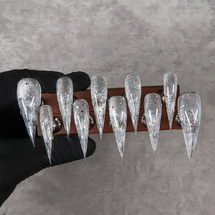 Glamouröser Stiletto Press-On Nagelset mit Glitzerelementen