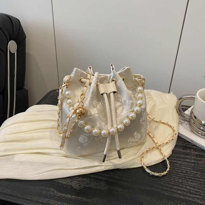 Elegante Blumenmuster-Zugband-Eimer-Tasche Karnz