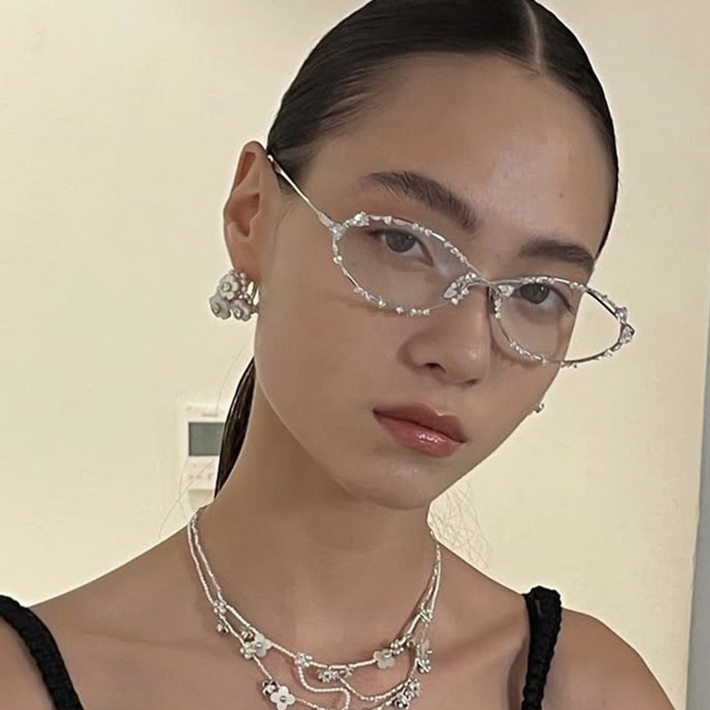 Damen exklusive Sonnenbrille mit funkelndem Strass-Besatz und elegantem Metallrahmen Karnz