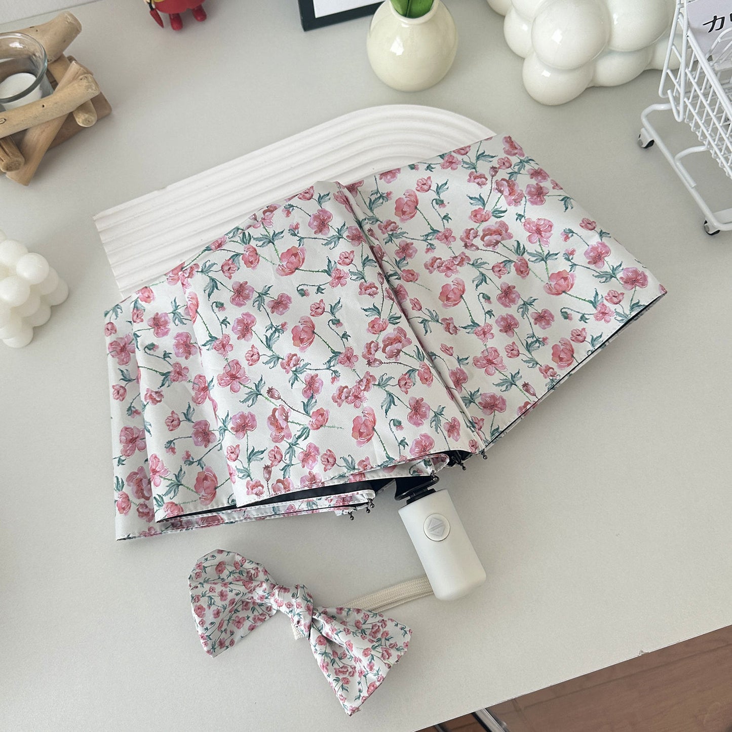 Damen Faltregenschirm mit floralem Design und praktischem Aufbewahrungssystem Karnz