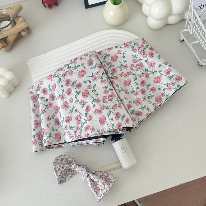 Damen Faltregenschirm mit floralem Design und praktischem Aufbewahrungssystem Karnz