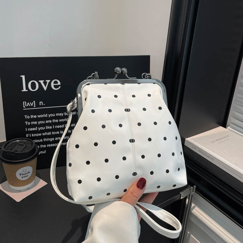 Stylische Pünktchen-Handtasche