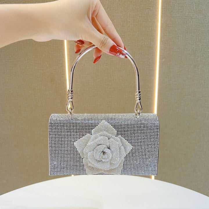 Rhinestone-besetzte florale Clutch