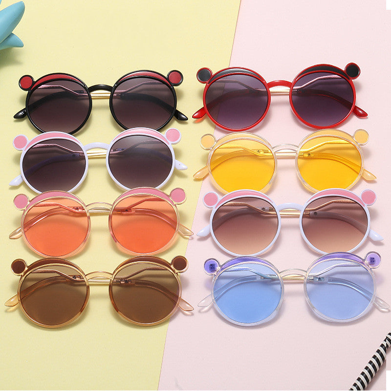 Damen Fashion-Runde Sonnenbrille mit innovativem Rahmen und farbigen Gläsern Karnz