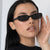 Damen modische Katzenaugen-Sonnenbrille mit transparentem Kunststoffrahmen und UV-Schutz Karnz