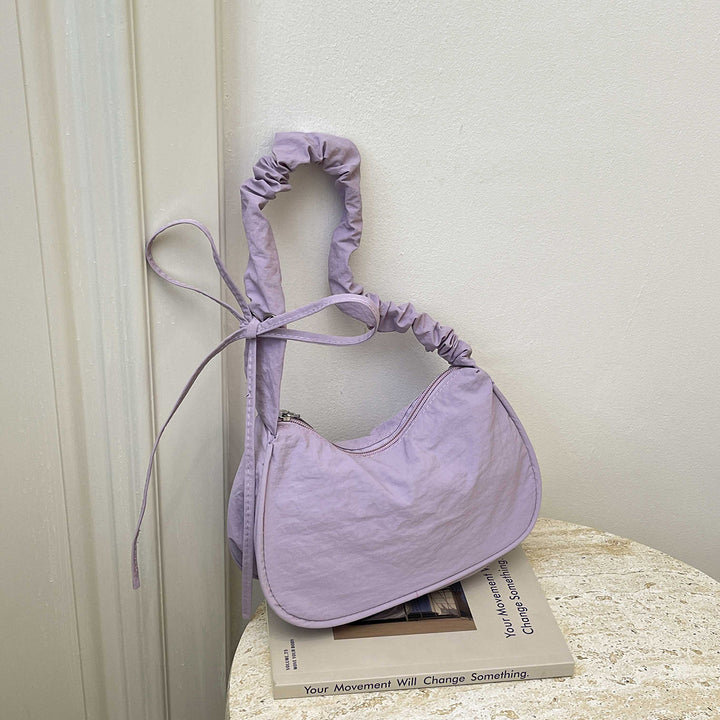 WoTexturiertes Stoff Sling Bag Karnz