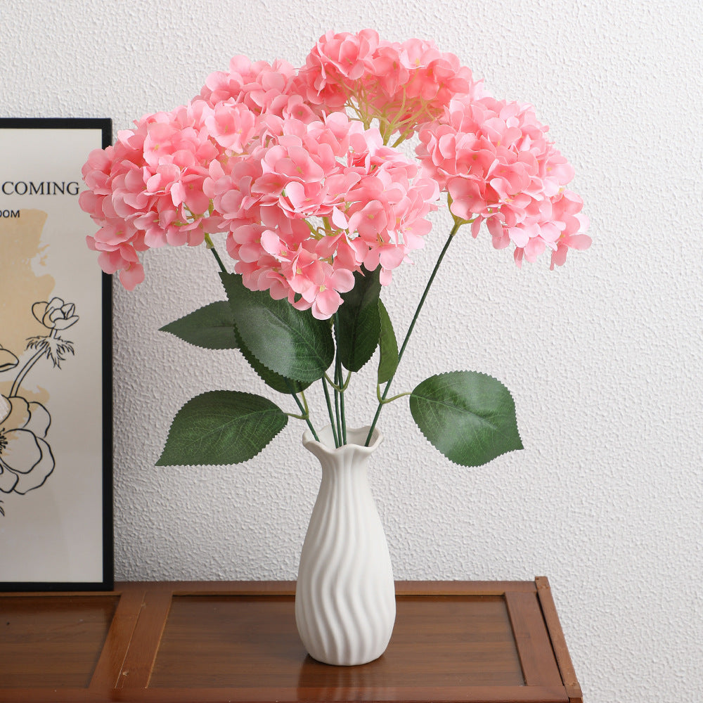 Dekorative Kunstblumenarrangement Karnz