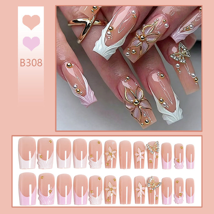 Kunstnagelset mit eleganten Blüten- und Glitzerverzierungen Karnz