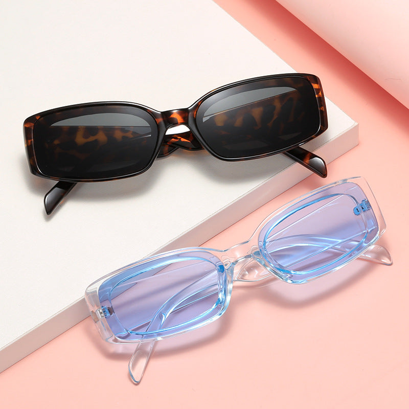 Damen stilvolle Sonnenbrille mit quadratischen Gläsern und transparentem Rahmen Karnz