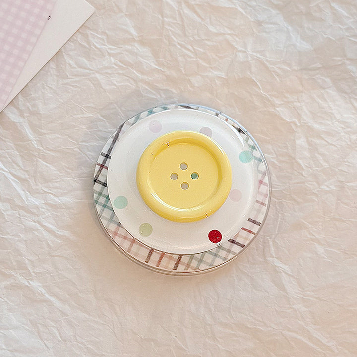 Dekorativer Untersetzer im Button-Design Karnz