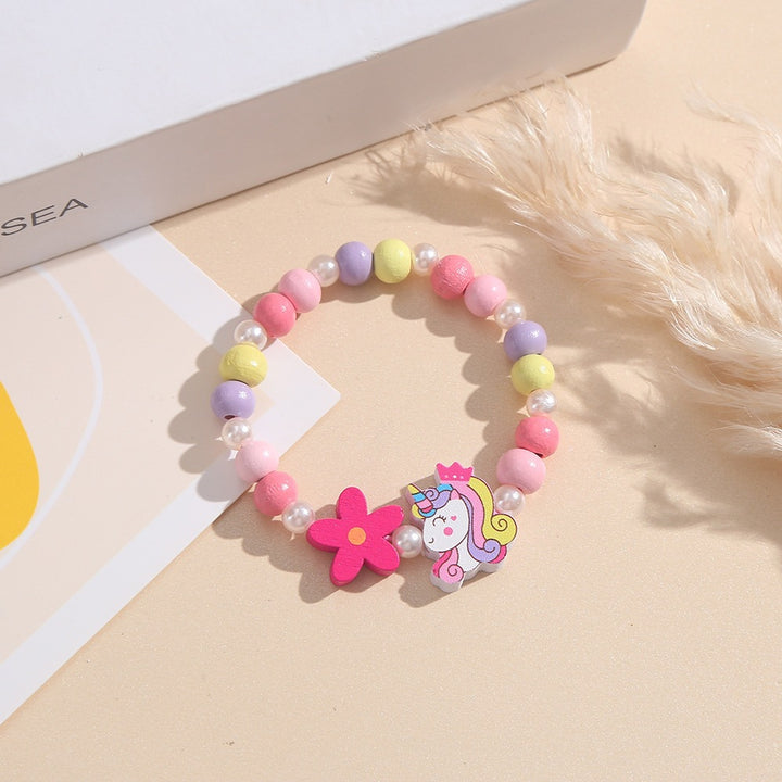 Verspieltes Kinderarmband mit Einhorn- und Blumenmotiv Karnz