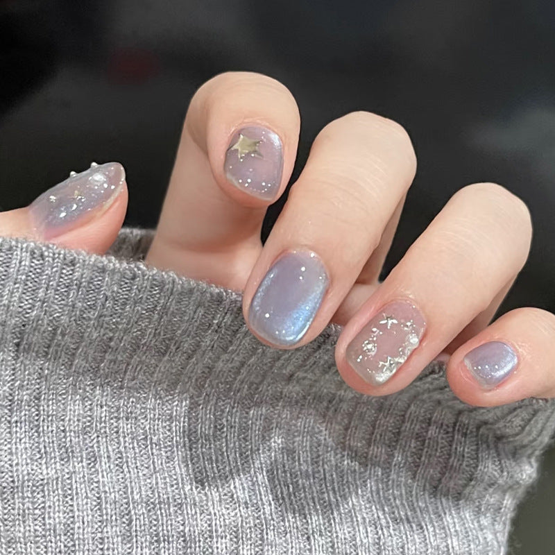 Künstlerisches Press-On Nagelset mit himmlischem Thema Karnz