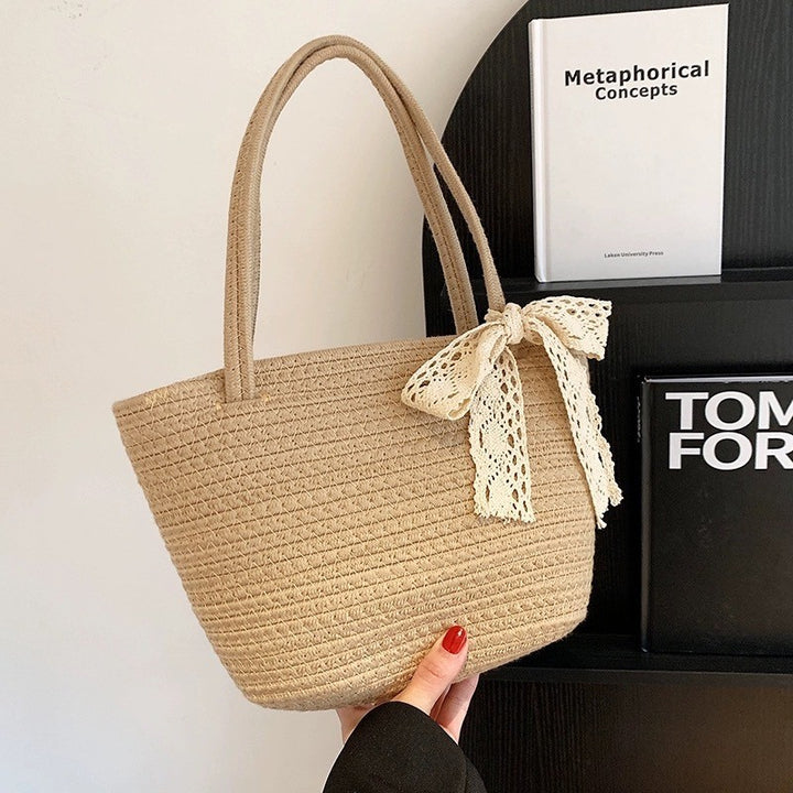 Damen Handtasche mit dekorativem Häkelband Karnz