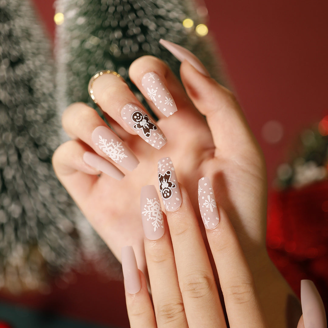 Elegante Acryl-Nägel mit goldenen Akzenten Karnz