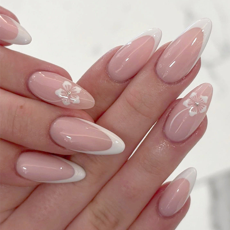 Elegantes Stiletto Press-On Nagelset mit floralem Design Karnz