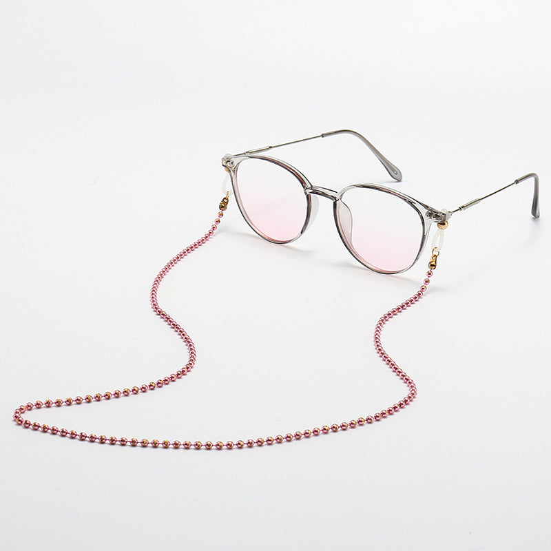 Modische Katzenaugenbrille mit Perlenkette Karnz