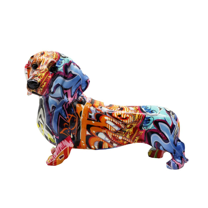 Bunte Dekofigur eines Dachshunds Karnz