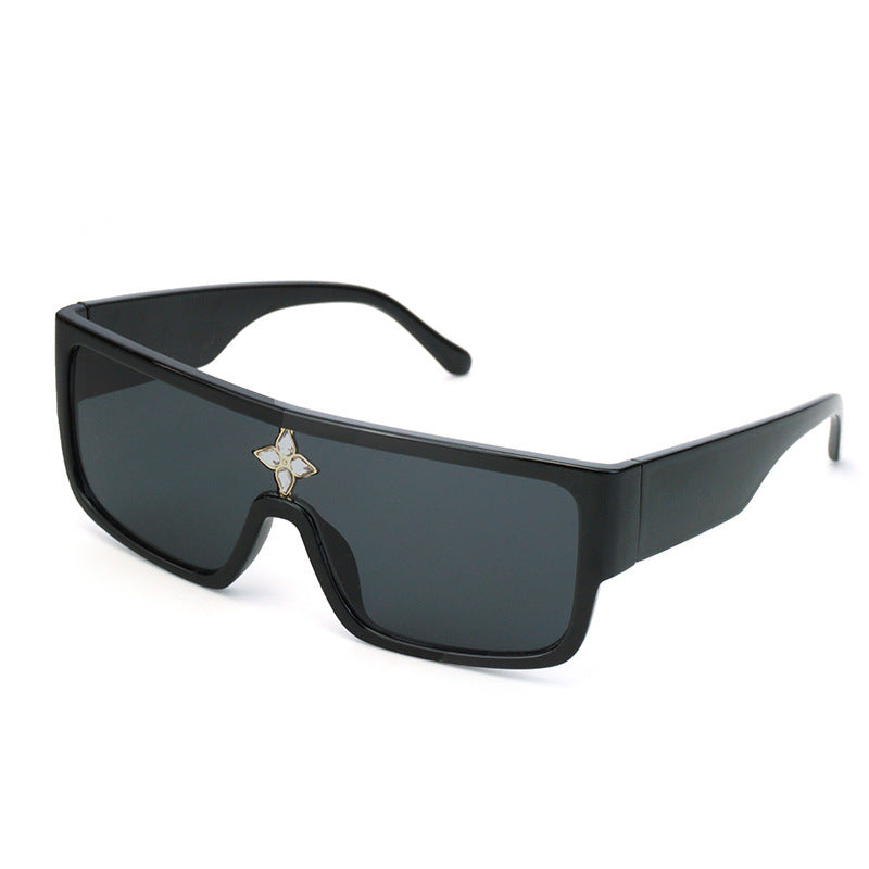 Damen Sonnenbrille im futuristischen Oversized-Design mit funkelndem Dekor Karnz