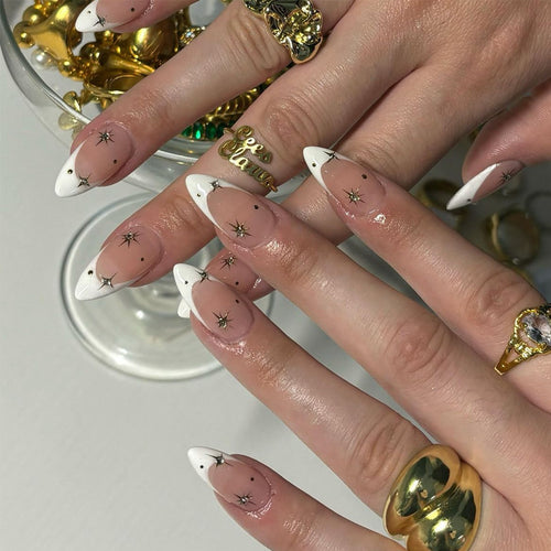 Künstlerische Stiletto Press-On Nagelkunst mit Stern- und Ombre-Design Karnz