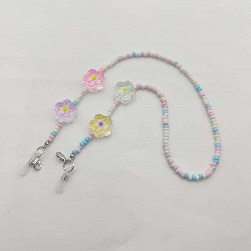 Verspielte Brillenhalterkette mit Blumenanhängern Karnz