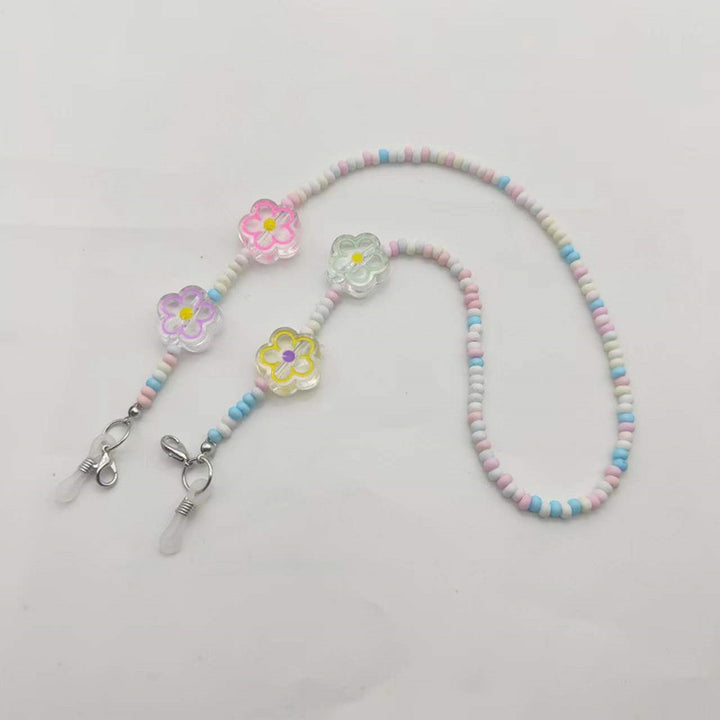 Verspielte Brillenhalterkette mit Blumenanhängern Karnz