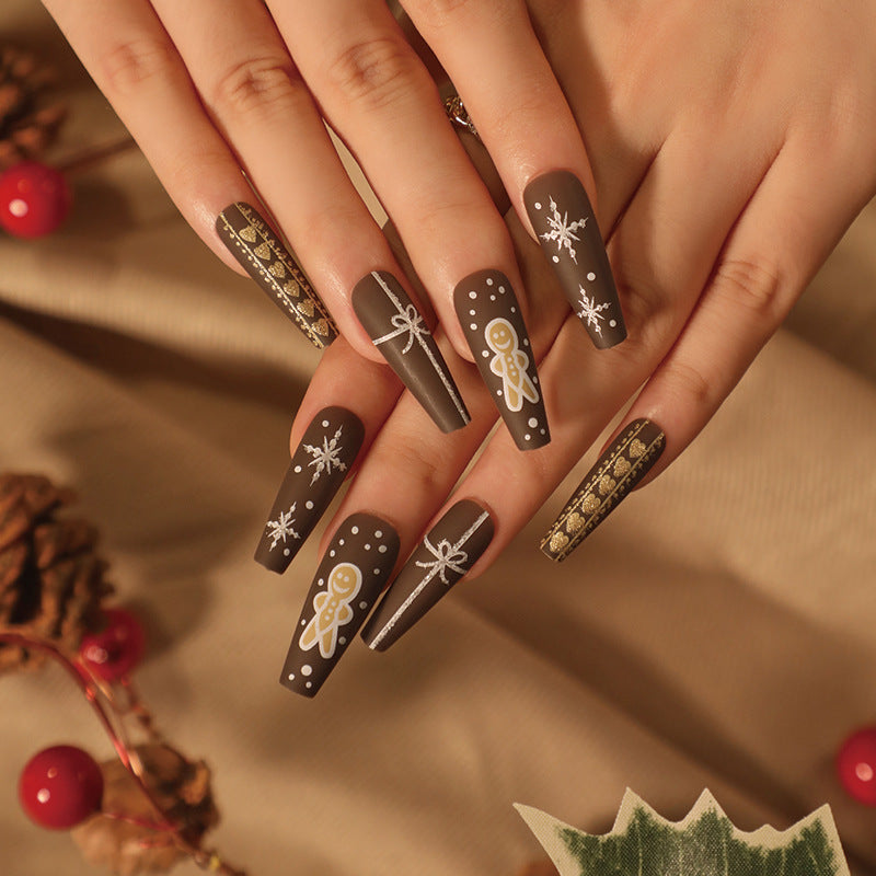 Elegante Acryl-Nägel mit goldenen Akzenten Karnz