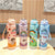 Damen Fantasie Trinkflasche mit praktischem Trageband Karnz