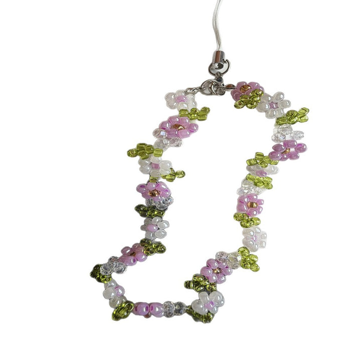Perlenbesetzte Blumenschmuckkette Karnz