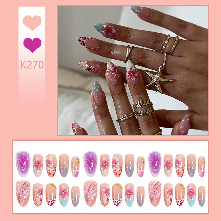 Kunstnagel-Set mit floralen und glitzernden Akzenten Karnz