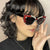 Damen extravagante Cat-Eye Sonnenbrille mit funkelndem Strassbesatz Karnz