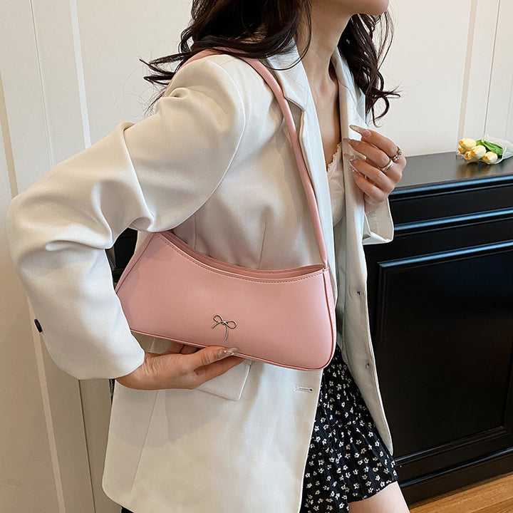 Elegante geschwungene Handtasche Karnz
