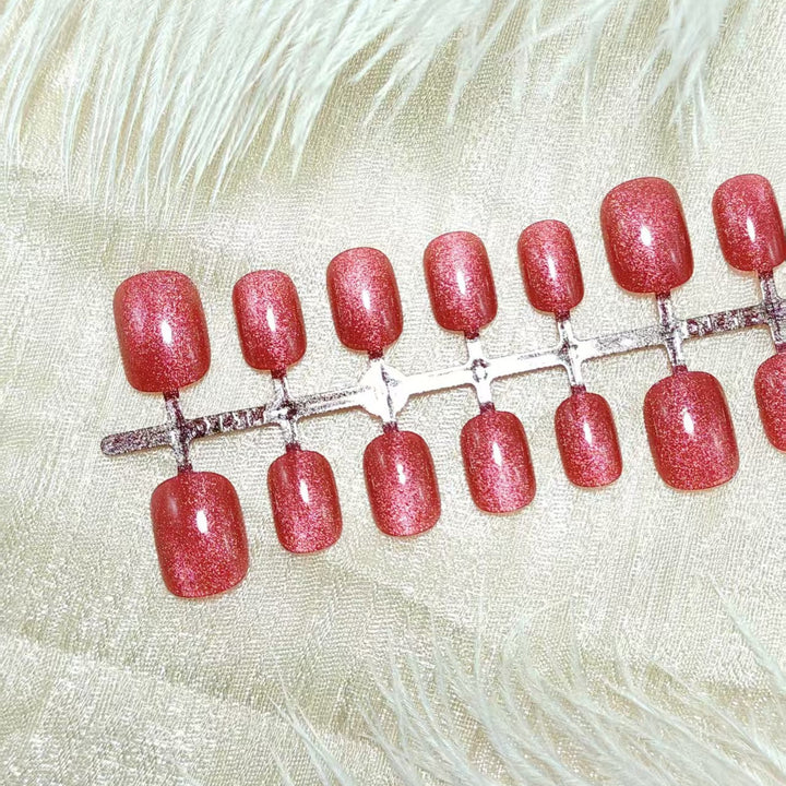 Glitzernde Kunstnägel mit Hochglanz-Effekt Karnz