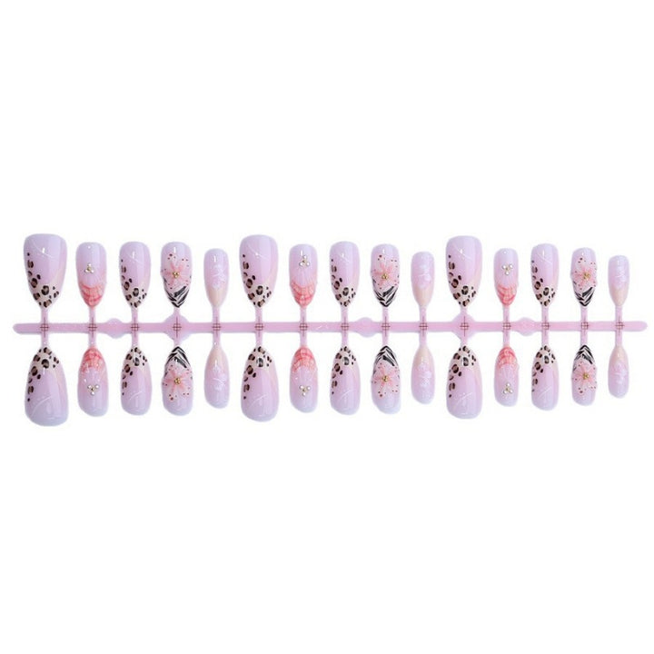 Kunstnagelset mit floralen und Leoparden-Designs Karnz