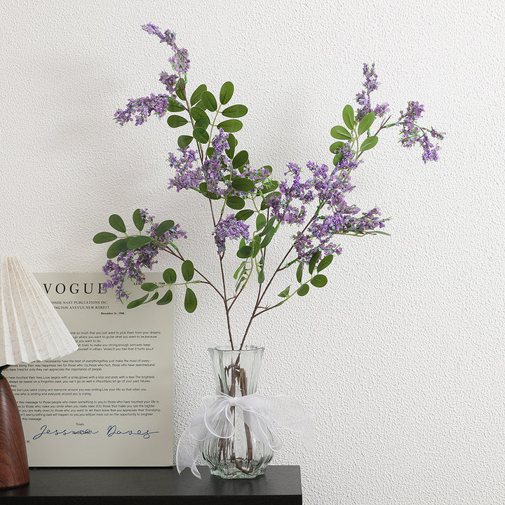 Künstlicher Blütenzweig mit lebendigen lila Blüten Karnz