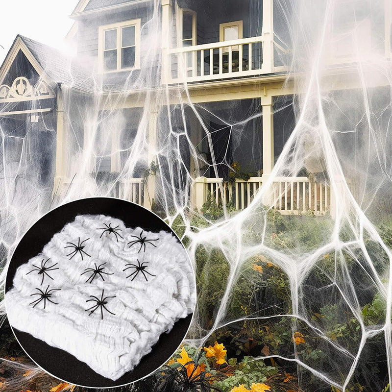 Dekorative Halloween Spinnennetz mit Kunstspinnen