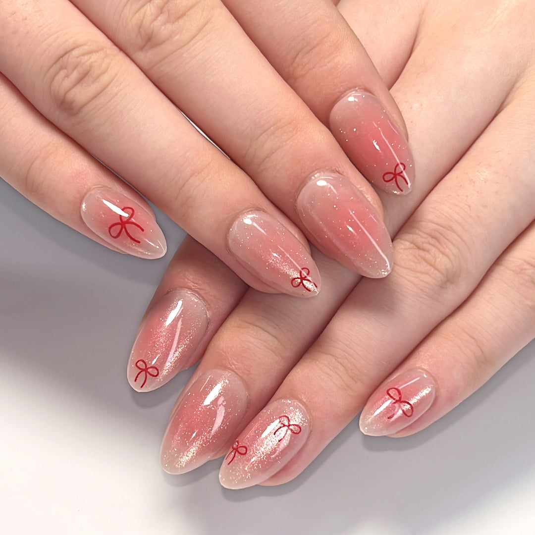 Künstliche Nagelkunst mit Schleifenmotiv Karnz