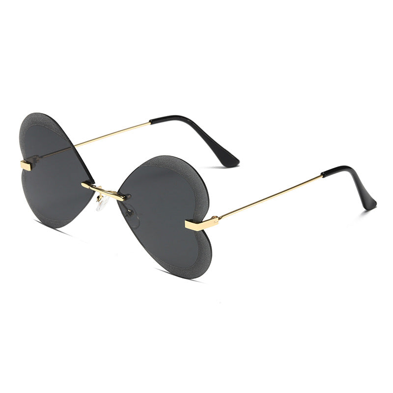 Damen Herzförmige Sonnenbrille im trendigen Design Karnz