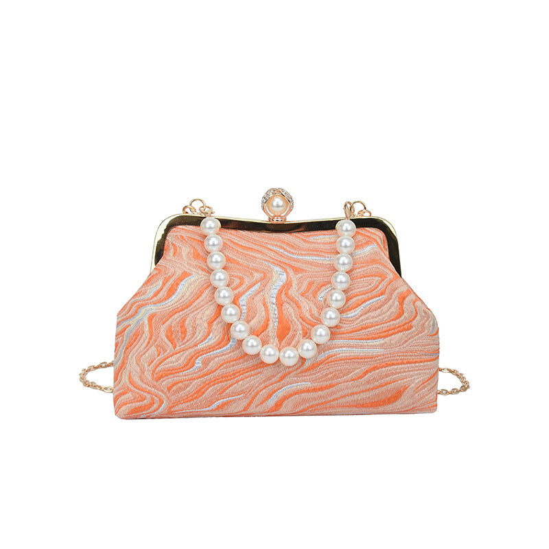 Elegante perlenverzierte Abendhandtasche