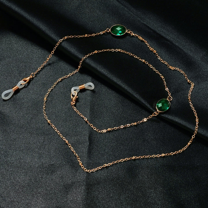 Eleganter mit Edelsteinen verzierter Brillenhalter Karnz