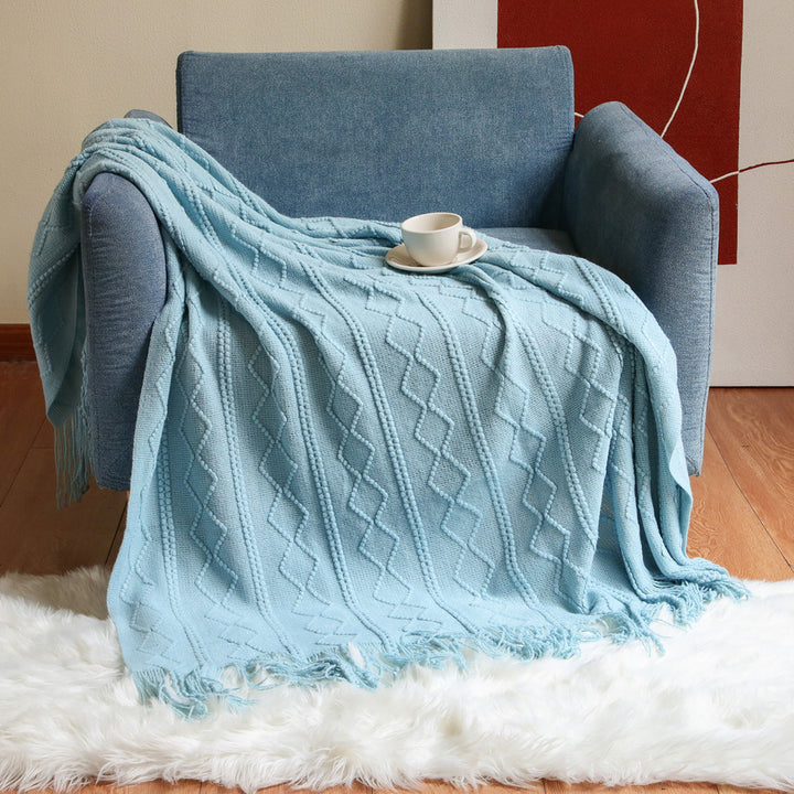 Gemütliche gestrickte Wurfdecke