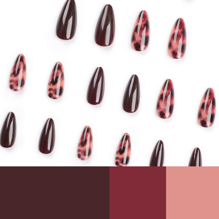 Elegante Stiletto-Nägel mit tierischem Design Karnz