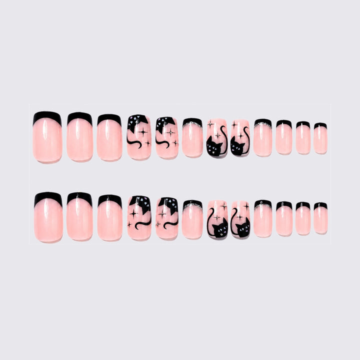 Kunstnagelset mit Glamourösen Schwarz-Designs und funkelnden Akzenten Karnz